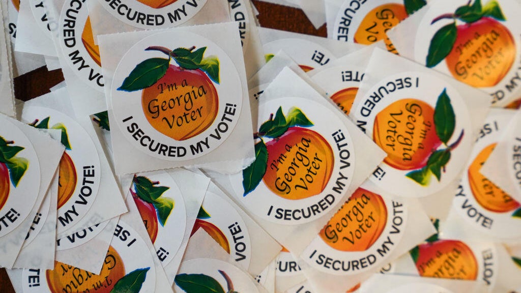 Civil rights groups file emergency lawsuit over absentee ballot delays in Gwinnett County — St. Simons Island Schools news