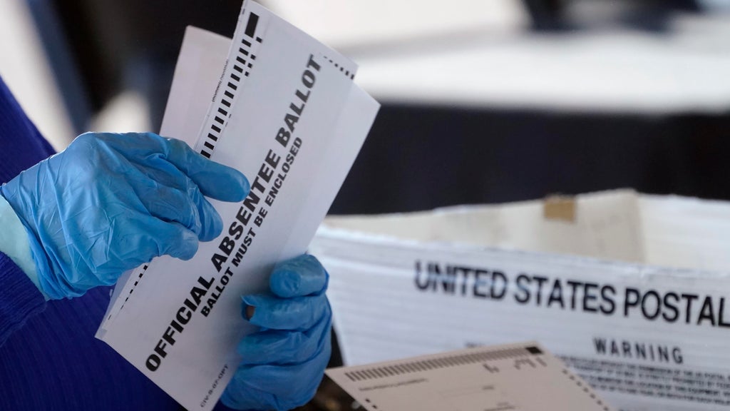 Absentee ballot issues may disenfranchise thousands of metro Atlanta voters, lawsuit claims — St. Simons Island Community news